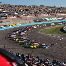 Jimmie Johnson leads Mark Martin to the green flag at Phoenix International Raceway